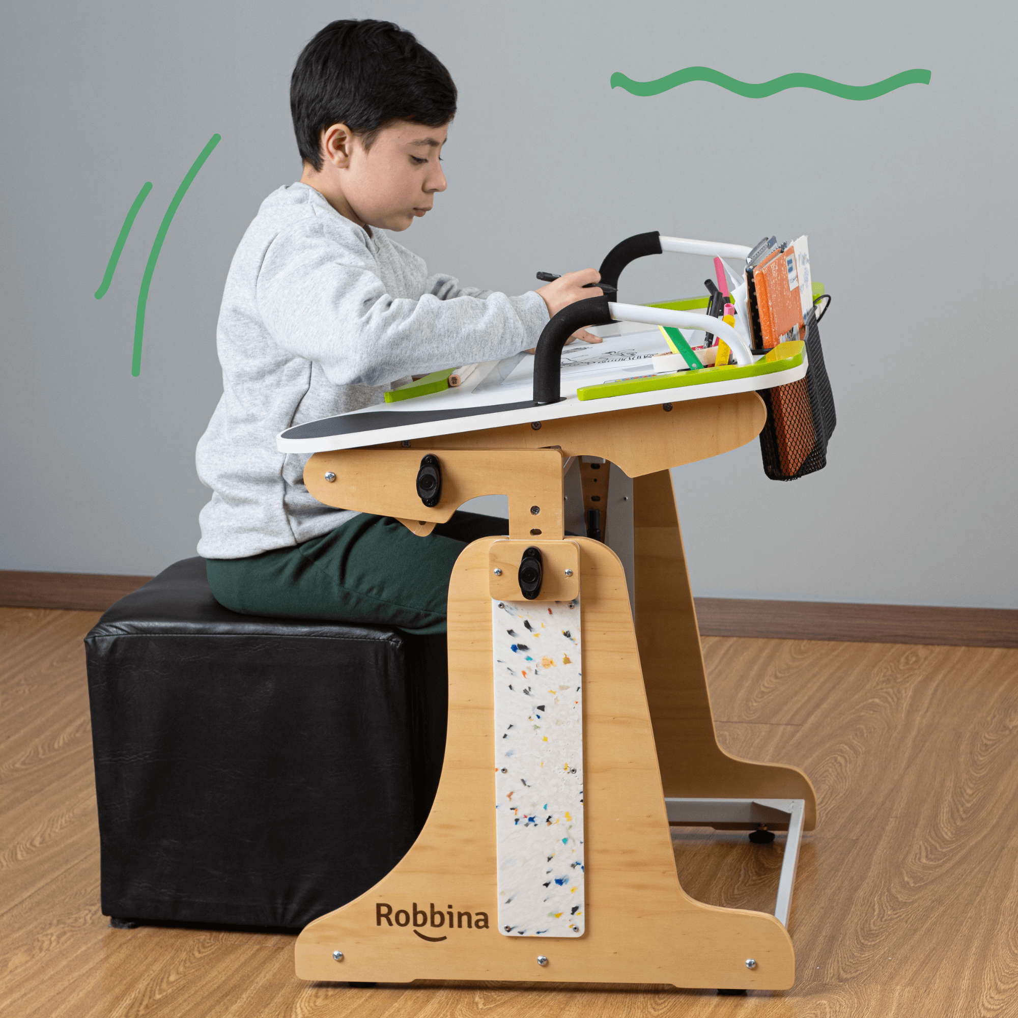 Mesa Robbina en uso con materiales de actividad.